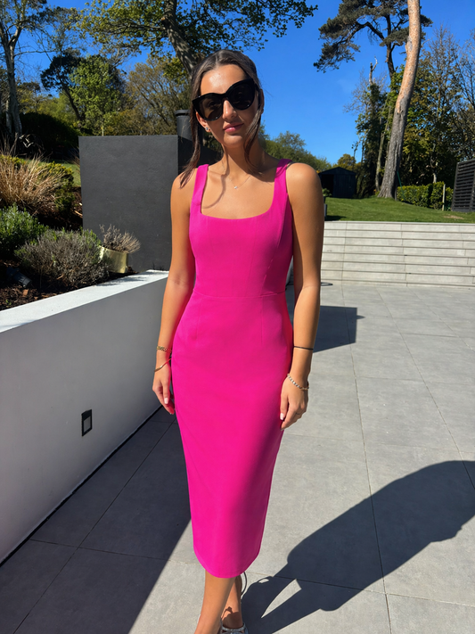 LUNA PINK FITTING DRESS WITH BOW BACK - DELIVERY 1st WEEK OF MAY