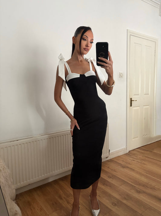 BLACK BANDAGE WITH WHITE BOW SHOULDERS