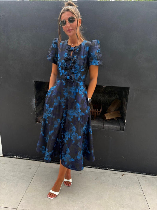 EMMY BLUE AND NAVY FLORAL BOW DRESS
